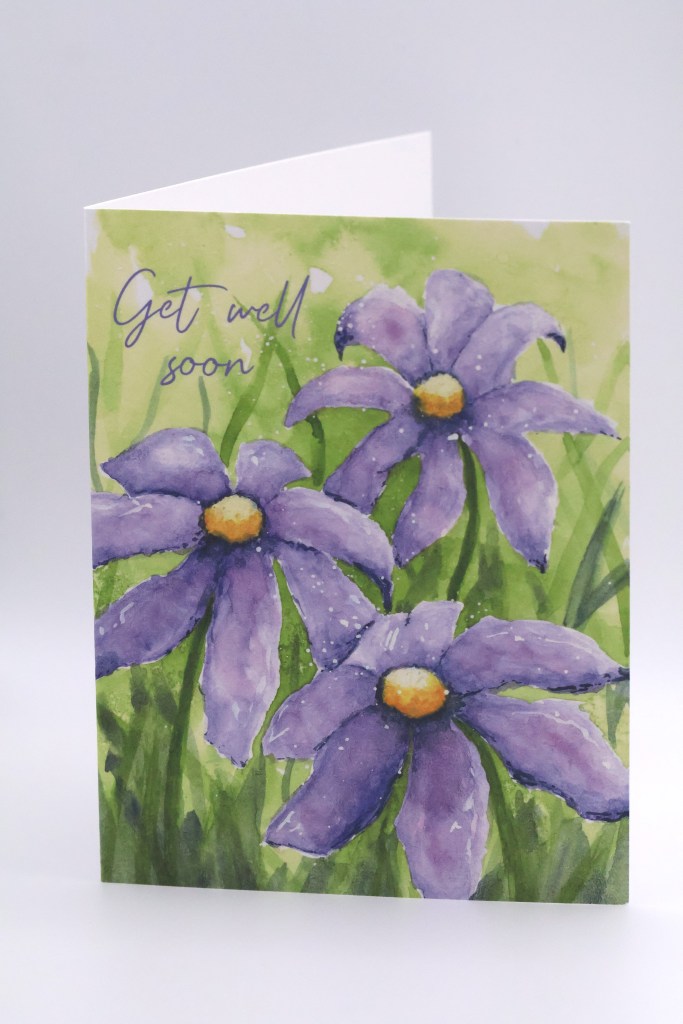 Three Blue Flowers in a Field Greeting Card