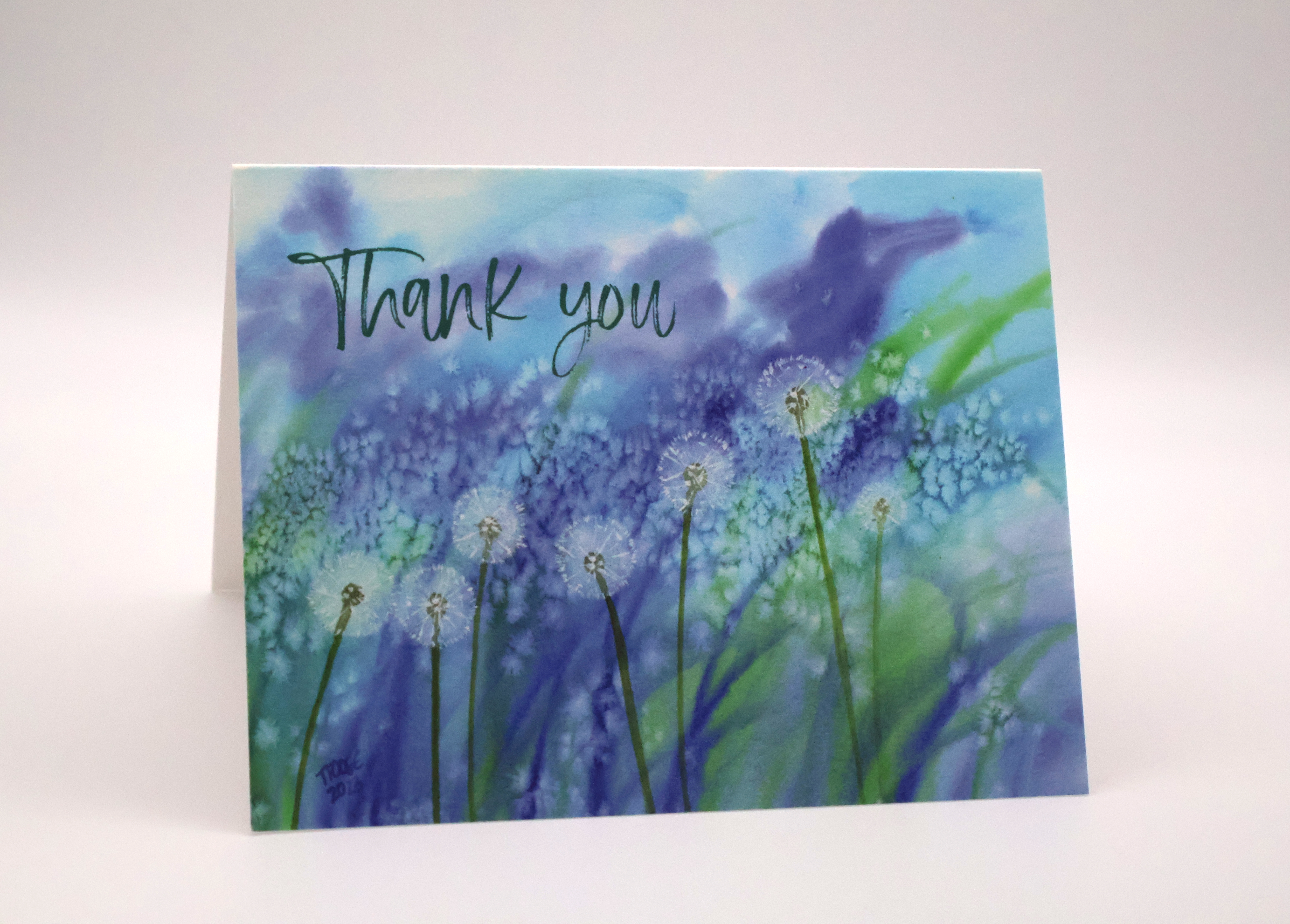 Blue and Green Dandelions Greeting Card - Image 1